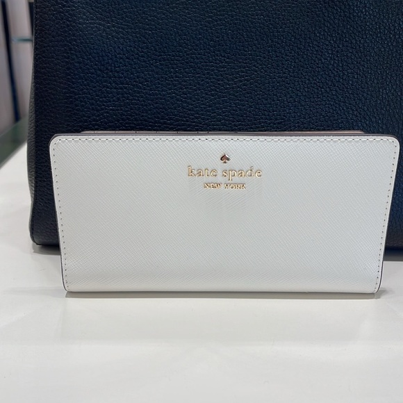 Kate Spade Madison Large Slim Bifold Wallet
Meringue 
NWT - Picture 12 of 16